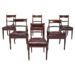 A harlequin set of twelve Regency dining chairs  , circa 1815, to include two elbow chairs, circa