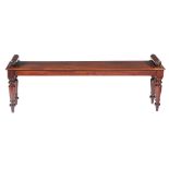 A Victorian mahogany hall bench  , circa 1840, the seat with moulded edge and flanked by rests with