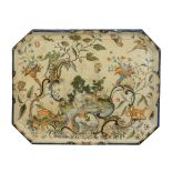 A Rouen faience shaped rectangular tray,   mid 18th century, decorated in the Rococo manner with an