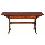 A George III mahogany and ebony strung sofa table  , circa 1790, the rectangular top incorporating