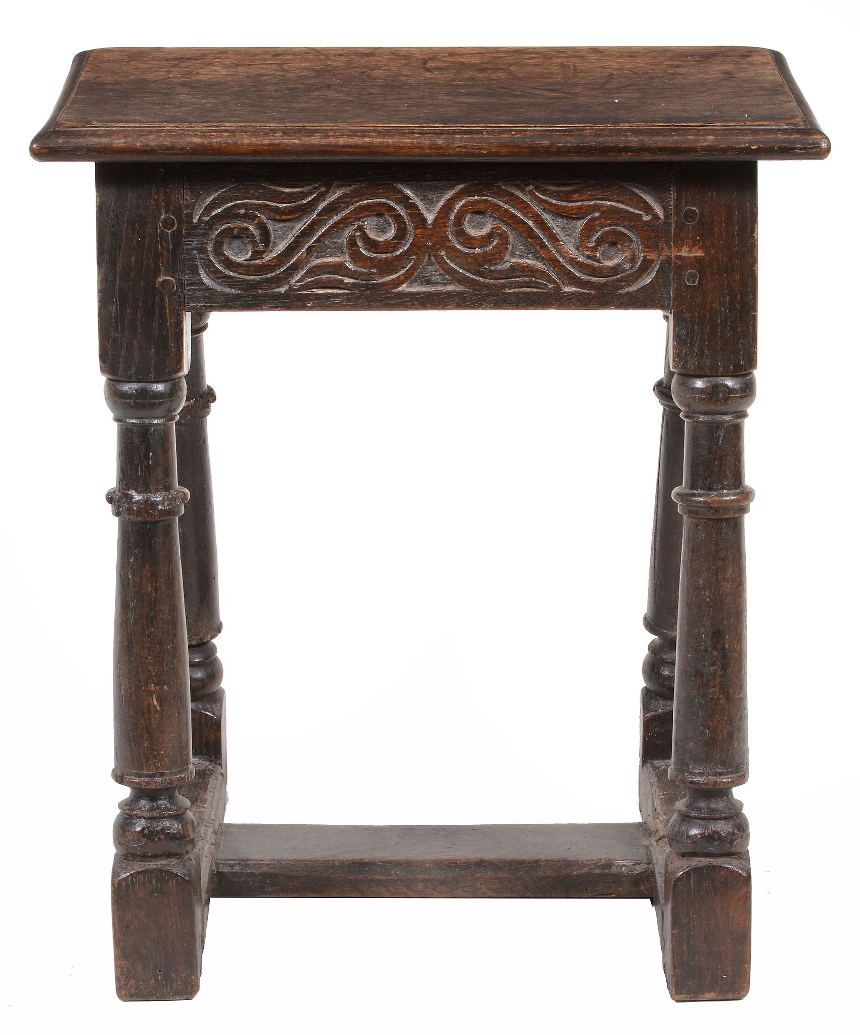A Charles II oak joint stool  , circa 1660, the seat with moulded edge above a freize with scroll - Image 2 of 2