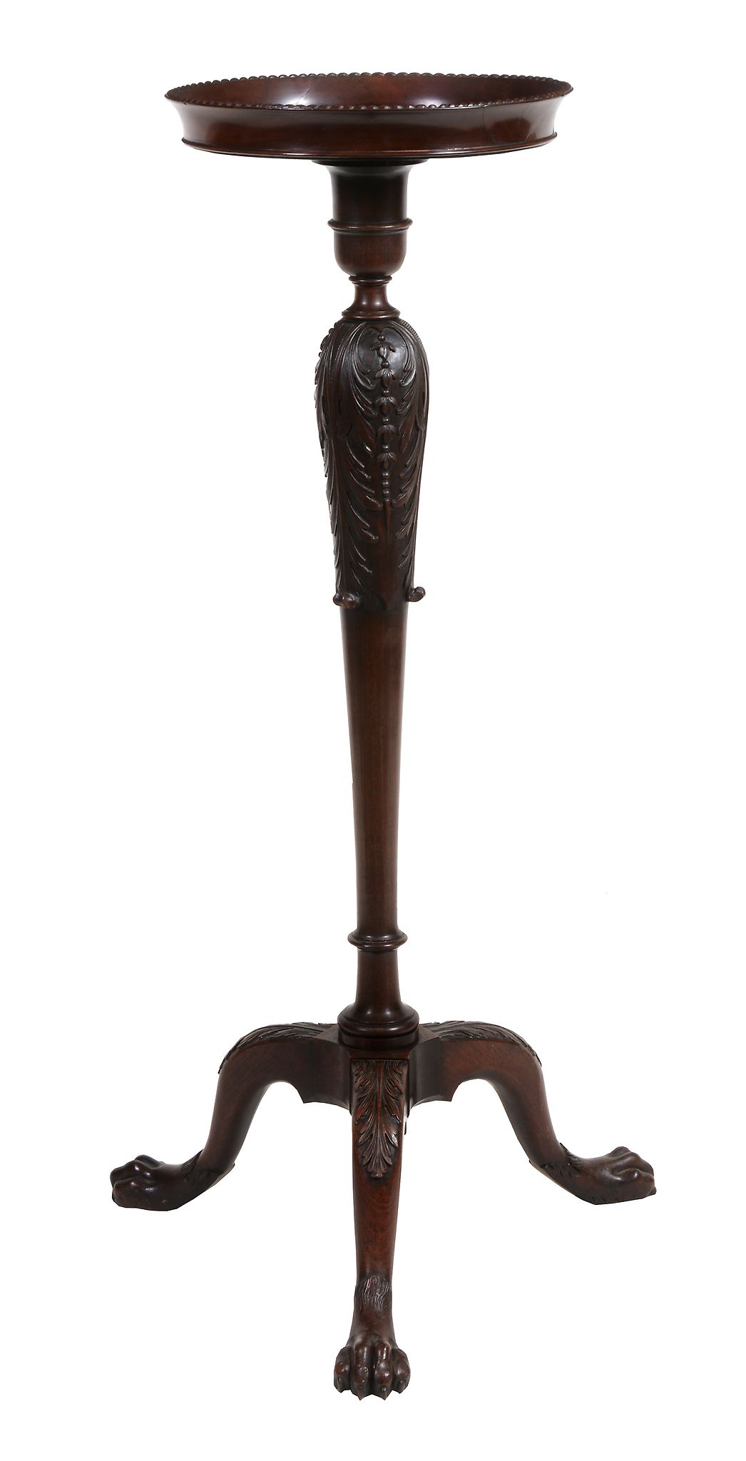 A George II mahogany torchere stand  , circa 1850, the flared beaded circular top with galleried