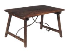 A Spanish walnut writing table  , late 17th century, the rectangular top above square section legs