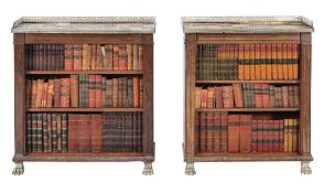 A matched pair of Regency rosewood and brass inlaid bookcases  , circa 1815, each with specimen