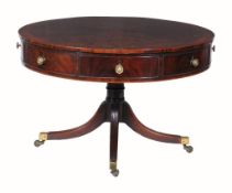 A George III mahogany drum library table,   circa 1790, the crossbanded top with radiating plum