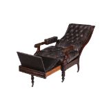 A Victorian mahogany and buttoned leather upholstered adjustable armchair,   circa 1860, the