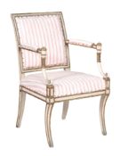 A George III cream painted and parcel gilt armchair,   circa 1800, the moulded rectangular padded