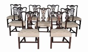 A harlequin set of nine George III mahogany dining chairs,   circa 1770, each with curved and