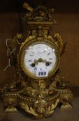 A French gilt meal mantel clock, enamel Roman numeral dial, 33cm high