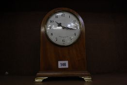 A Comitti of London mahogany mantel clock, 25cm high