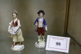 Two German porcelain figures of a girl and a boy, 15cm high (2)