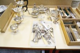 A quantity of silver plate, including: a part set of cutlery by Garrard & Co. Ltd (54 pieces), a