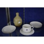 Dame Lucie Rie D.B.E (1902-1995), a tea cup and five saucers, off white glazed, each marked, the