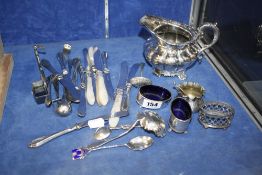 A pair of silver salts with blue glass liners, silver handled knives and a quantity of plated ware