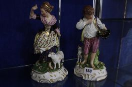 A pair of Derby Sampson Hancock models of a Shepherd and companion, 25cm high (2) (af)