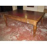 An early Victorian mahogany library table, circa 1840, with leather top, fitted three drawers to