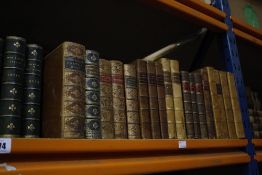 A quantity of leather bound volumes to include 'Waverley Novels', 'Hood's Poetical Works',