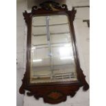 A George II style mahogany fretwork mirror with gilt ho-ho bird cresting 92cm high, 49cm wide
