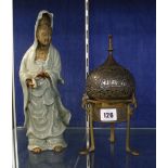 A Chinese celadon glazed guanyin, 28cm high and an Islamic censer and cover (2)