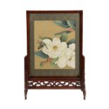 A Chinese hardwood table screen, the central panel decorated with butterfly on blossom, with border,