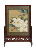 A Chinese hardwood table screen, the central panel decorated with butterfly on blossom, with border,