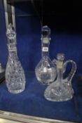Three glass decanters and two prints of birds of prey (5)