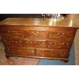 A mahogany chest of drawers, circa 1780 and later, formerly a mule chest, now with lift top above