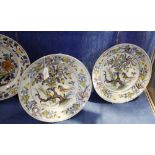 A pair of polychrome delft plates, decorated with birds and tree, 31cm in diameter and another delft