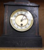 A late 19th/ early 20th Century black slate and red marble mantel clock, 24cm high