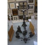 A pair of pewter candlesticks, a tripod bases with removable sconces (one a/f).