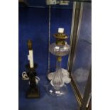 A Matthew Boulton style brass lamp, 46cm high (sold as parts) and a glass oil lamp converted to a