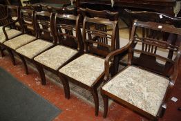 A set of six Regency style mahogany dining chairs to include two armchairs