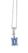 An aquamarine and diamond pendant,   the rectangular shaped aquamarine in a four claw setting,
