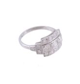A diamond panel ring,   the stepped mount pave set with old brilliant cut diamonds with old cut