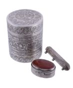 Three Middle Eastern silver coloured boxes,   comprising: a cylindrical box and cover, two