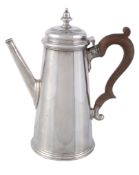 A silver tapered-cylindrical coffee pot by Thomas Ducrow  &  Sons,   Birmingham 1964, with a