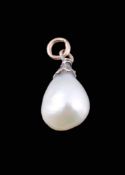 A natural pearl pendant , the drop shaped pearl with a rose cut diamond set...  A natural pearl