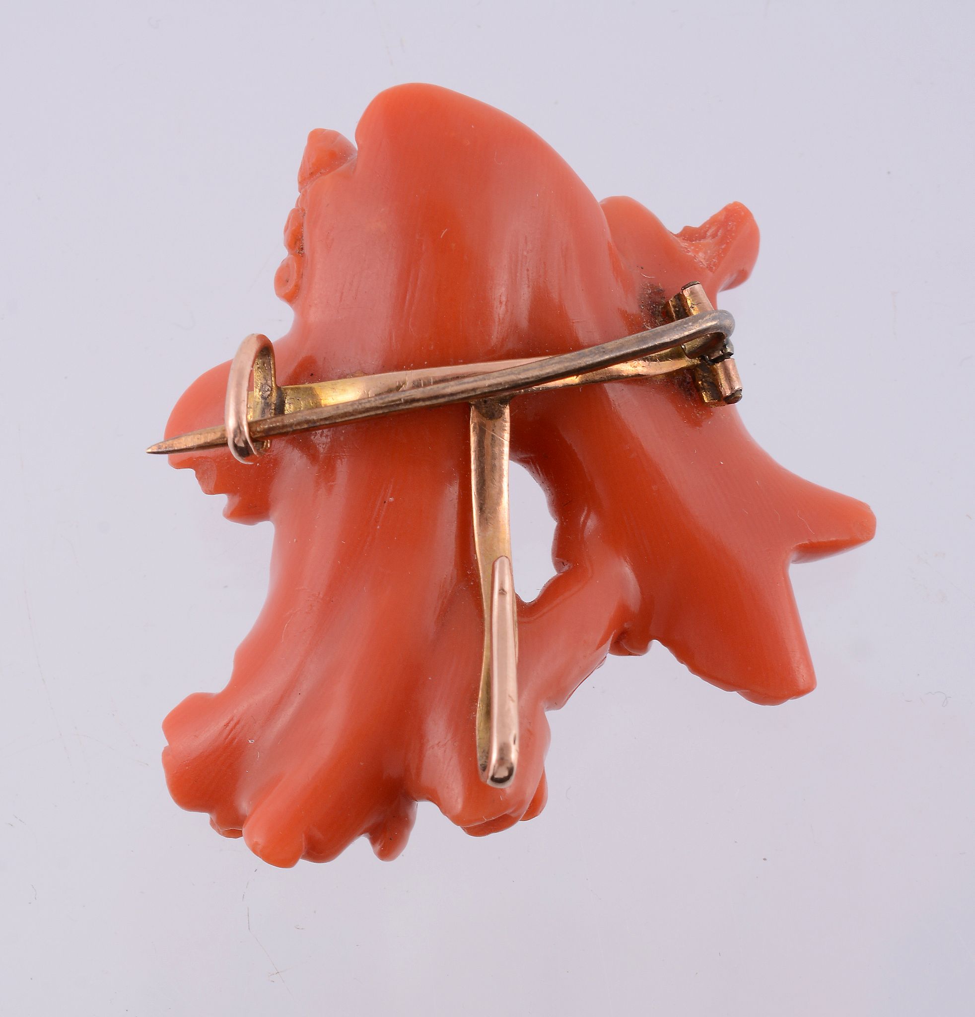 An early 19th century coral brooch, circa 1830, carved as Aurora  An early 19th century coral - Image 2 of 2