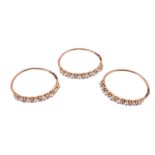 Three diamond and pearl hinged bangles, each one set with alternating old...  Three diamond and