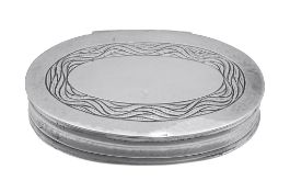 An Arts and Crafts hammered silver oval box by Omar Ramsden, London 1930  An Arts and Crafts