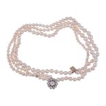 A pearl, cultured pearl and diamond necklace  A pearl, cultured pearl and diamond necklace,   the