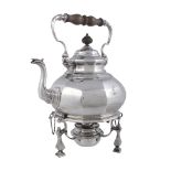A silver facetted baluster kettle on stand by Alfred James How, London 1910  A silver facetted