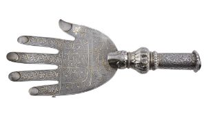An Indian silver parcel gilt Hand of Fatima staff finial, 19th century  An Indian silver parcel gilt