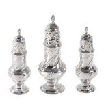 A set of three early George III silver casters by Robert Peaston, London 1762  A set of three