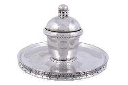 A Danish hammered silver circular inkwell by Georg Jensen  A Danish hammered silver circular inkwell