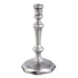 A George I silver facetted octagonal candlestick by Thomas Merry I, London 1716  A George I silver