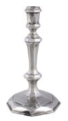 A George I silver facetted octagonal candlestick by Thomas Merry I, London 1716  A George I silver