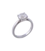 A platinum and diamond single stone ring, the brilliant cut diamond, weighing 1  A platinum and