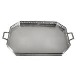 A silver twin handled canted-rectangular tray by Garrard & Co  A silver twin handled canted-
