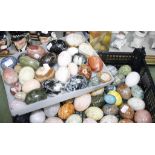 A quantity of assorted eggs  , to include marble, onyx and alabaster examples.